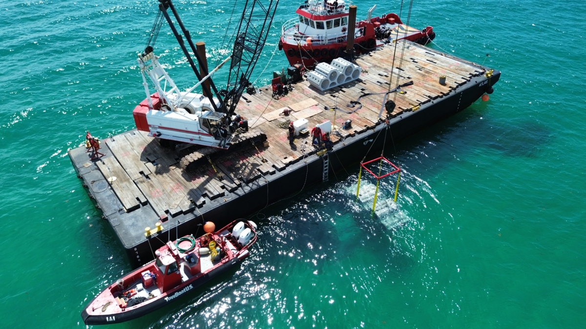 An aerial view of the construction barge and one of the newly installed SEAHIVE devices.